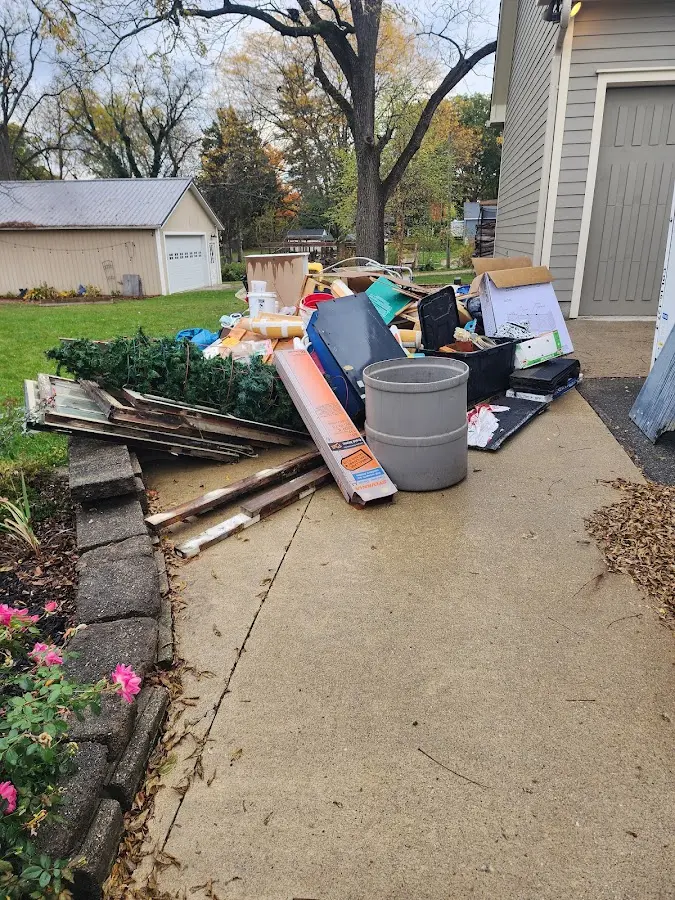 Dumpster being loaded with debris for Commercial Dumpster Rental in German Flatts